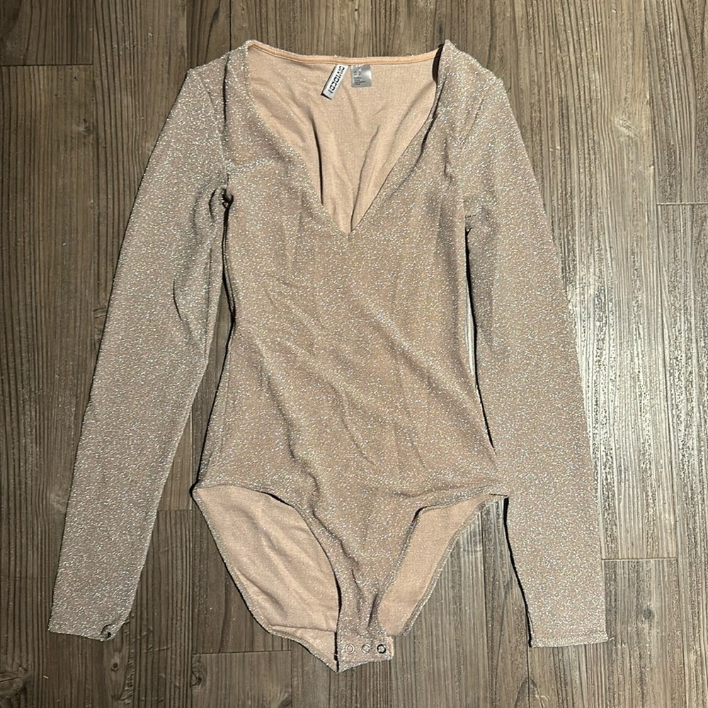 Sparkly champagne long sleeved body suit h&m
